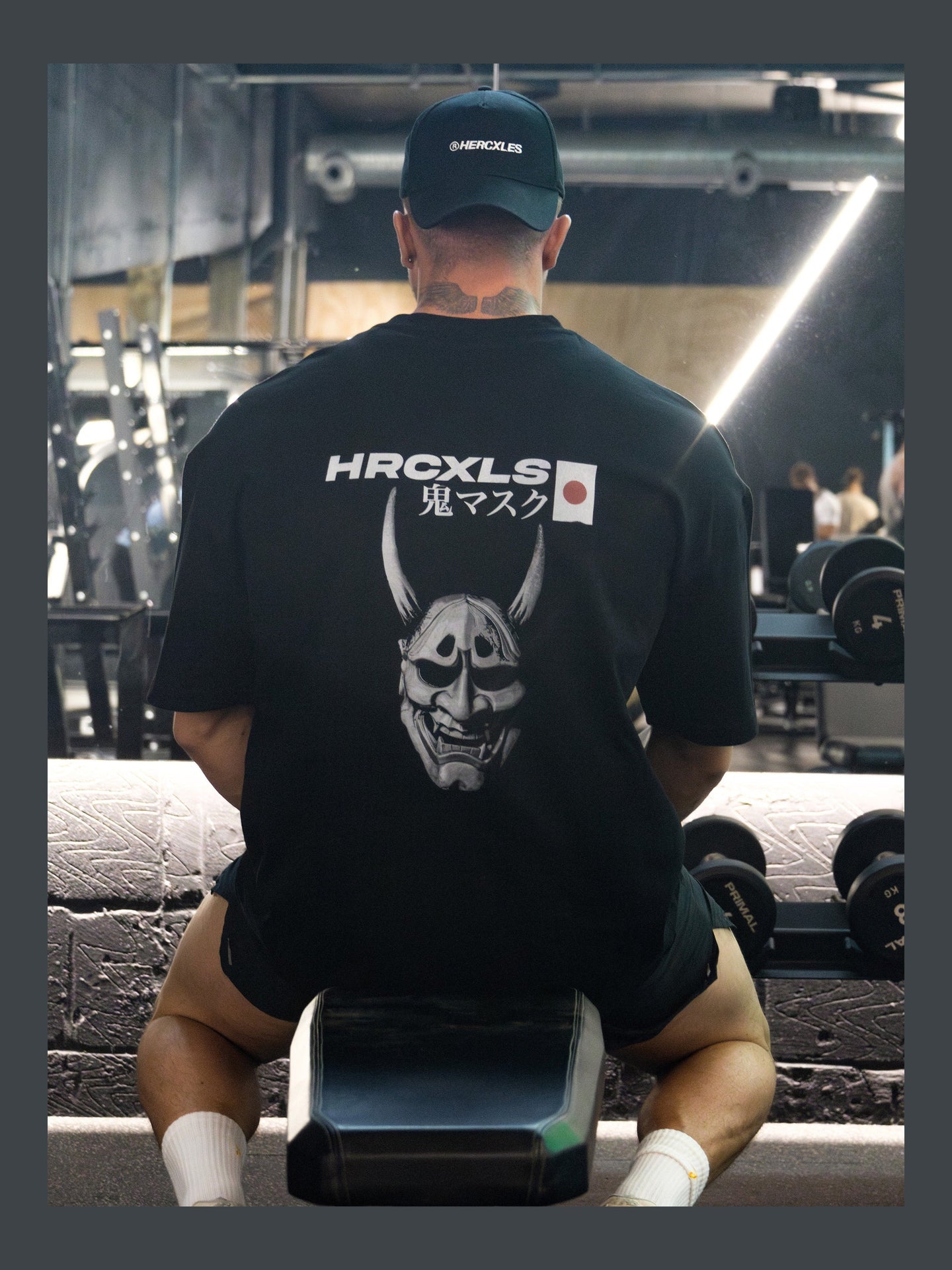 HERCXLES: Oni Oversized T-Shirt - Black model back seated