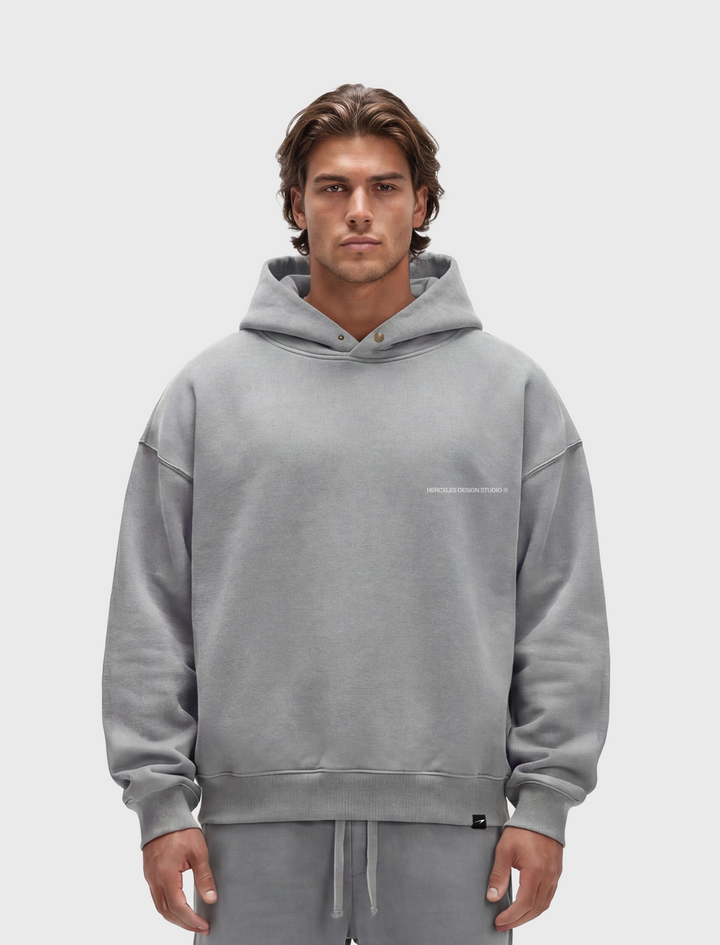 HERCXLES 2026: Studios Distressed Hoodie - Light Grey model front