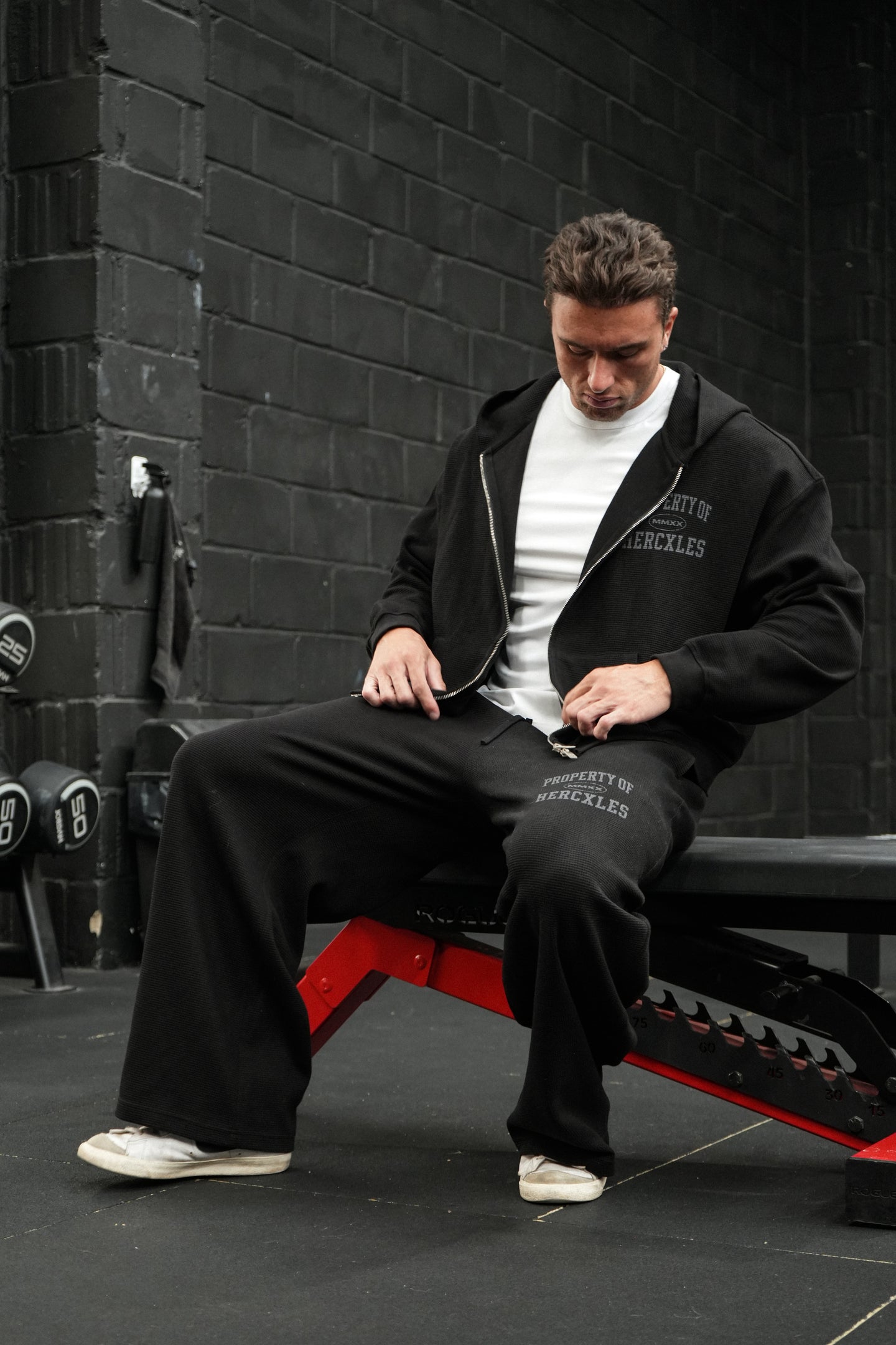 HERCXLES Property Of Waffle Boxy Zip Hoodie - Black seated model detail