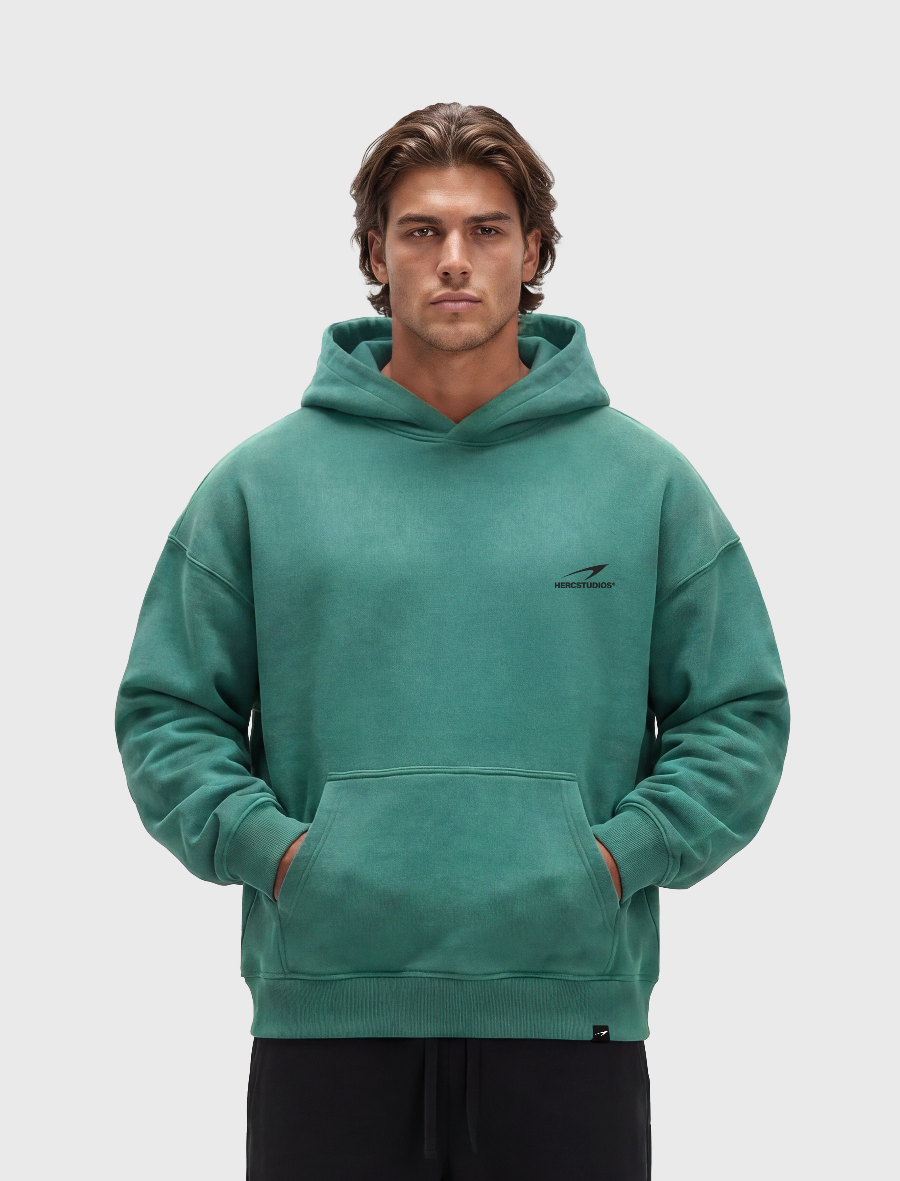 HERCSTUDIOS Hoodie - Medium Green model front