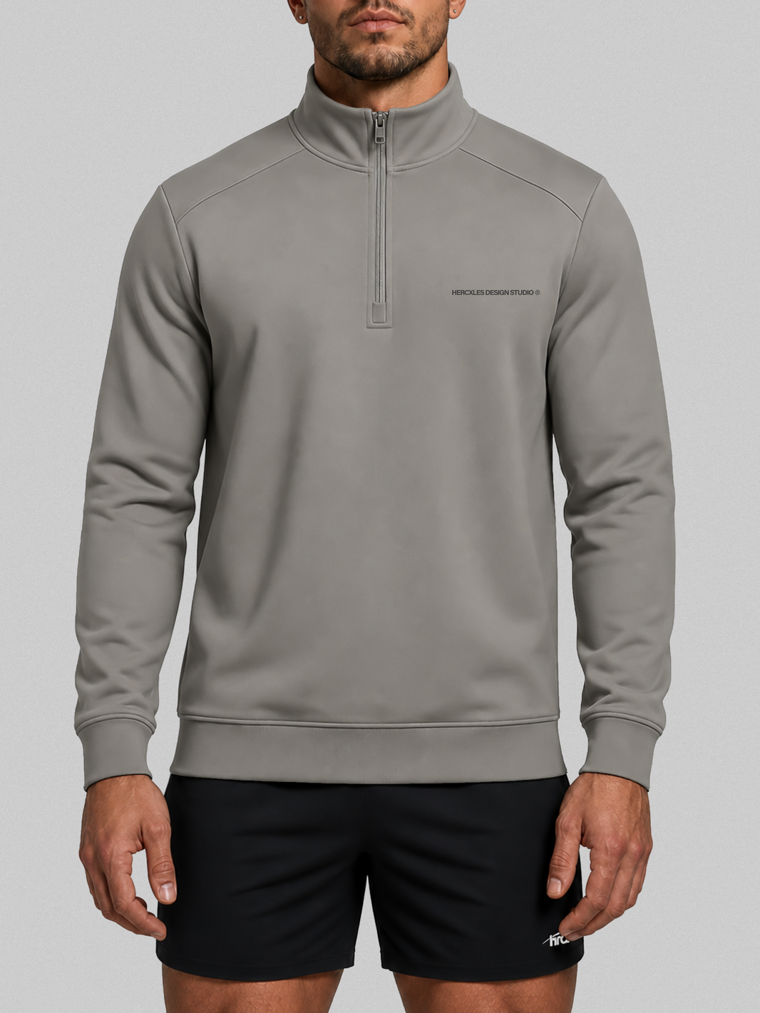 HCX feature detail: Studios Quarter Zip Sweatshirt - Grey model