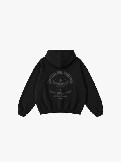 HERCXLES: Bodybuilding Tonal Oversized Hoodie - Black Beauty back flat lay