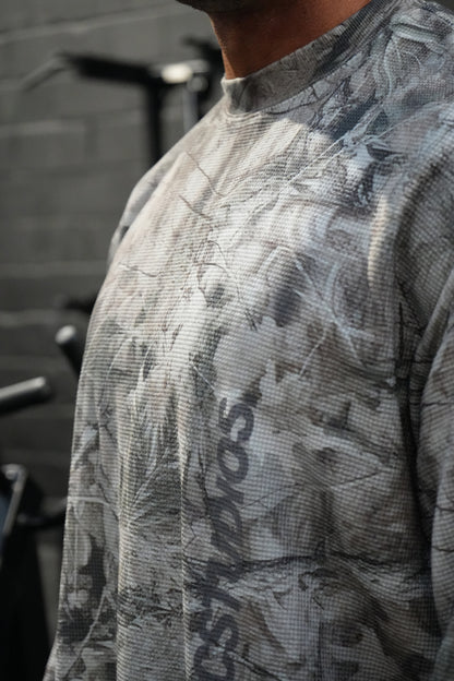 HERCSTUDIOS CAMO LONG SLEEVE - Tree Camo model close-up of waffle texture and chest print