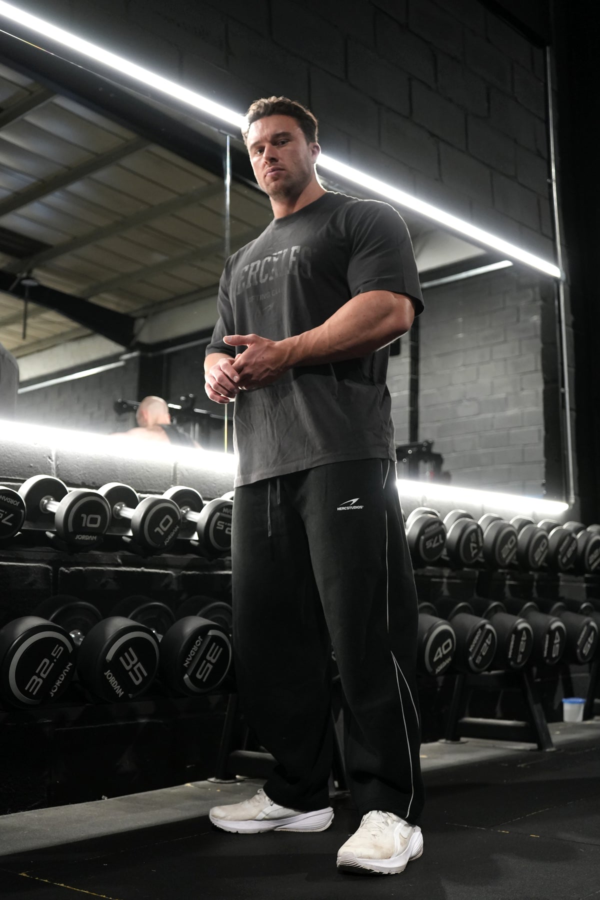 HERCSTUDIOS Reflective Sweatpants - Black full-length model photo