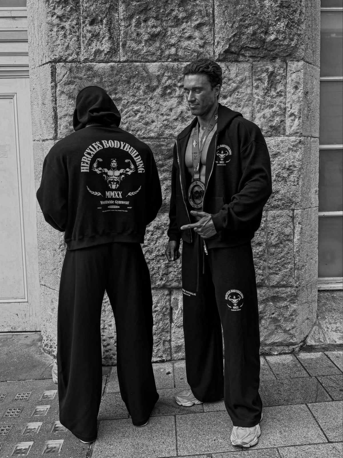 Worldwide Competitor Hoodie - Black / White model pullover back and zip hoodie front with joggers (p9)